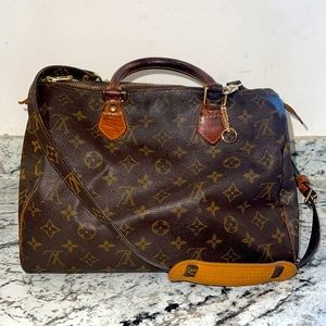 Authentic Louis Vuitton with shoulder strap